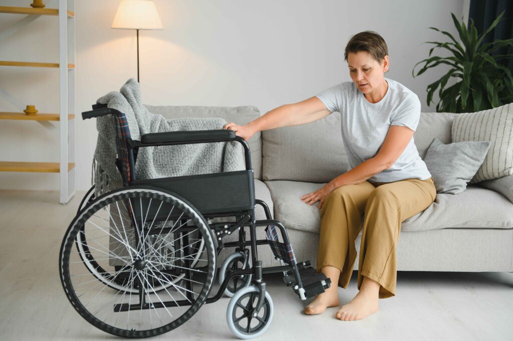 woman-trying-to-sit-down-in-wheelchair