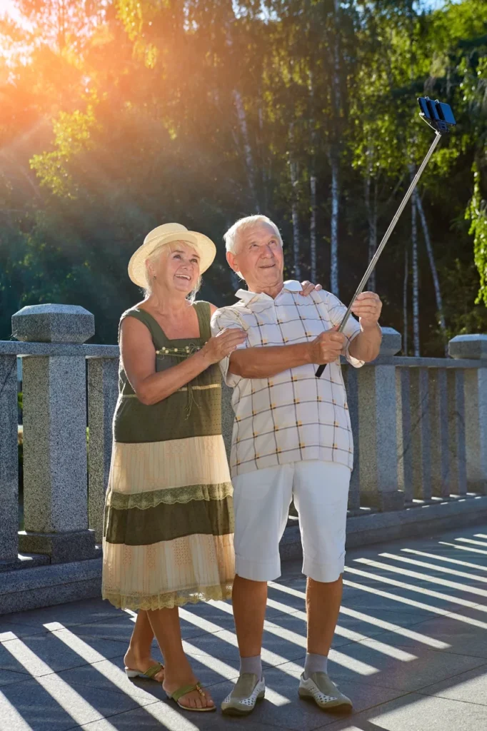 senior-couple-taking-selfie-summer
