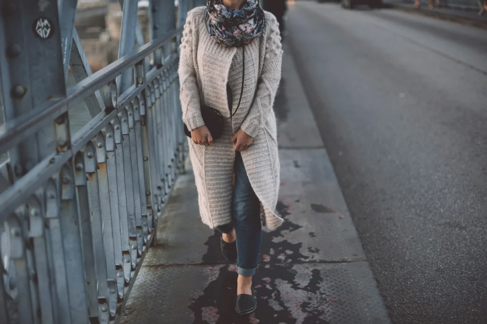 older woman walking on street