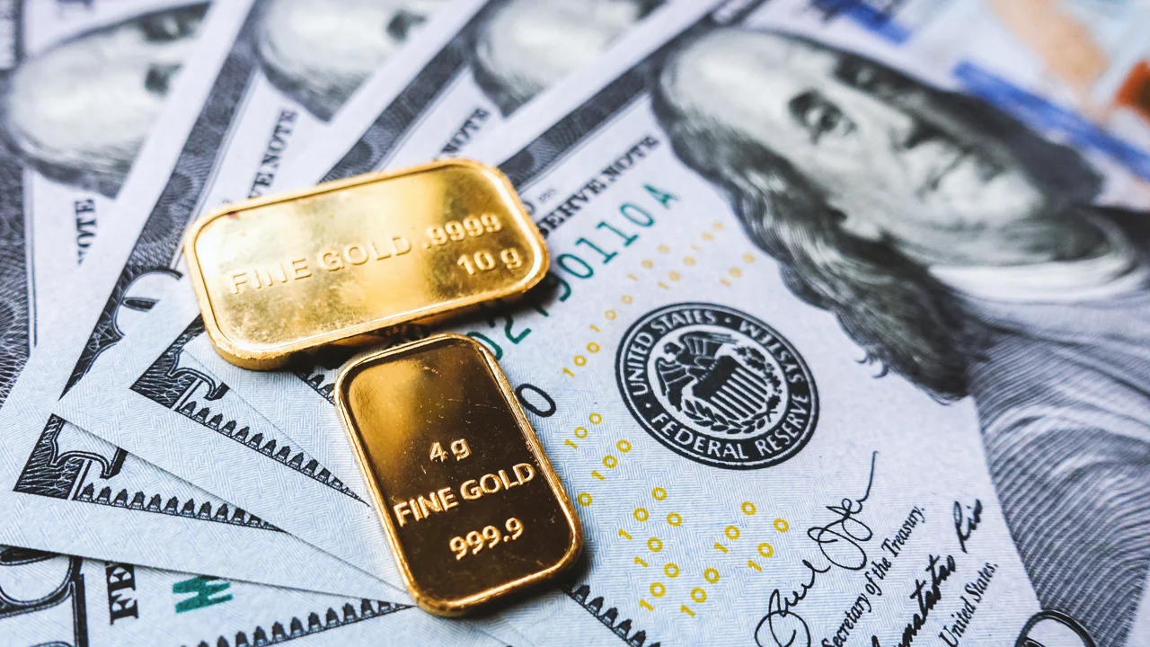 gold-bar-and-us-dollar