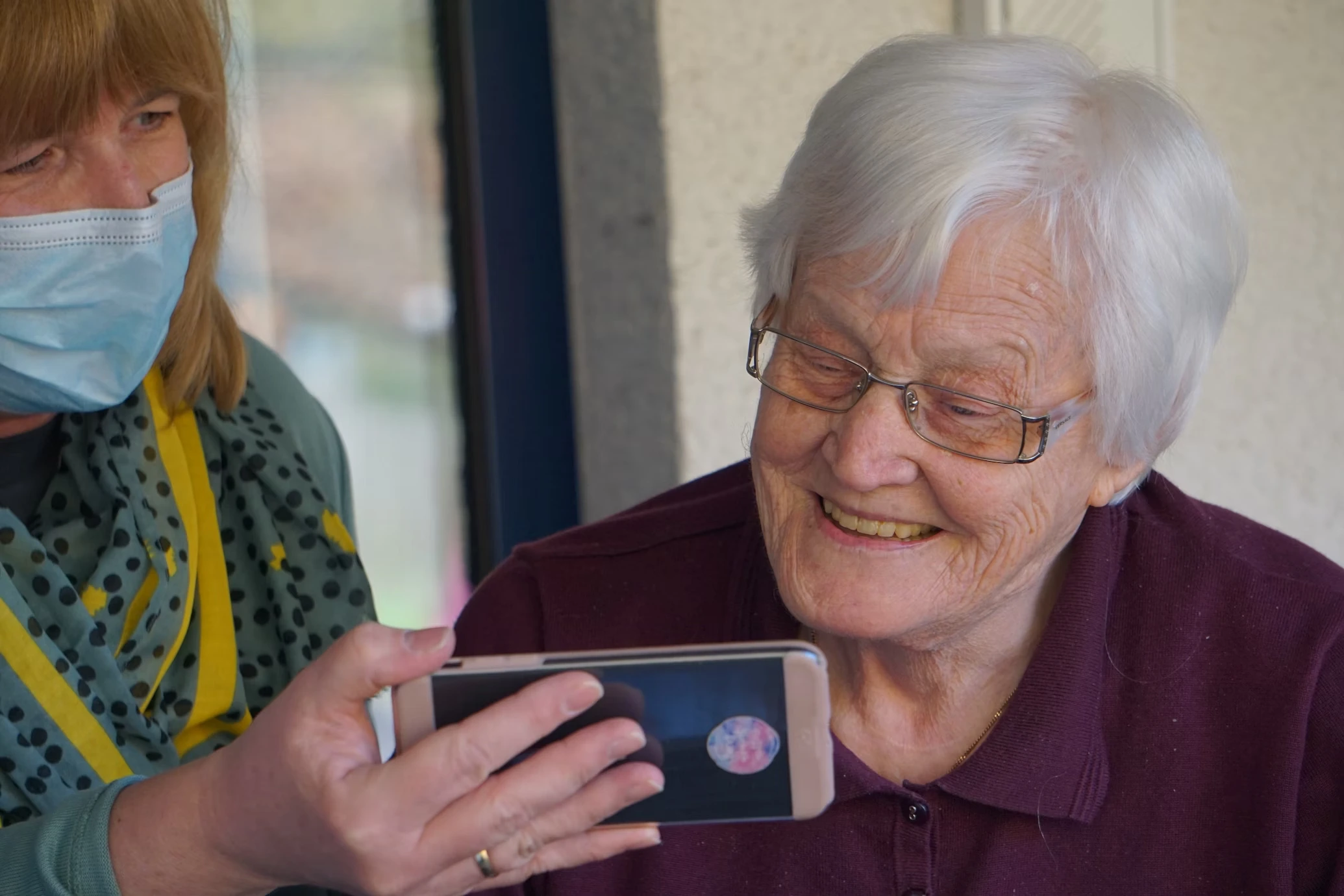 senior-using-medical-alert-app-georg-arthur-pfleuger-unsplash