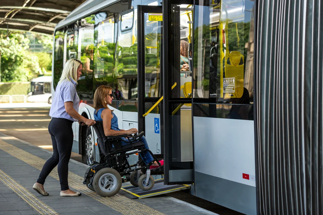 assistant-helps-wheelchair Large