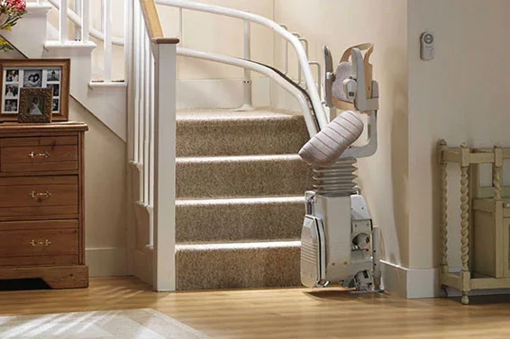 Stannah Sadler perched stairlift on bottom landing