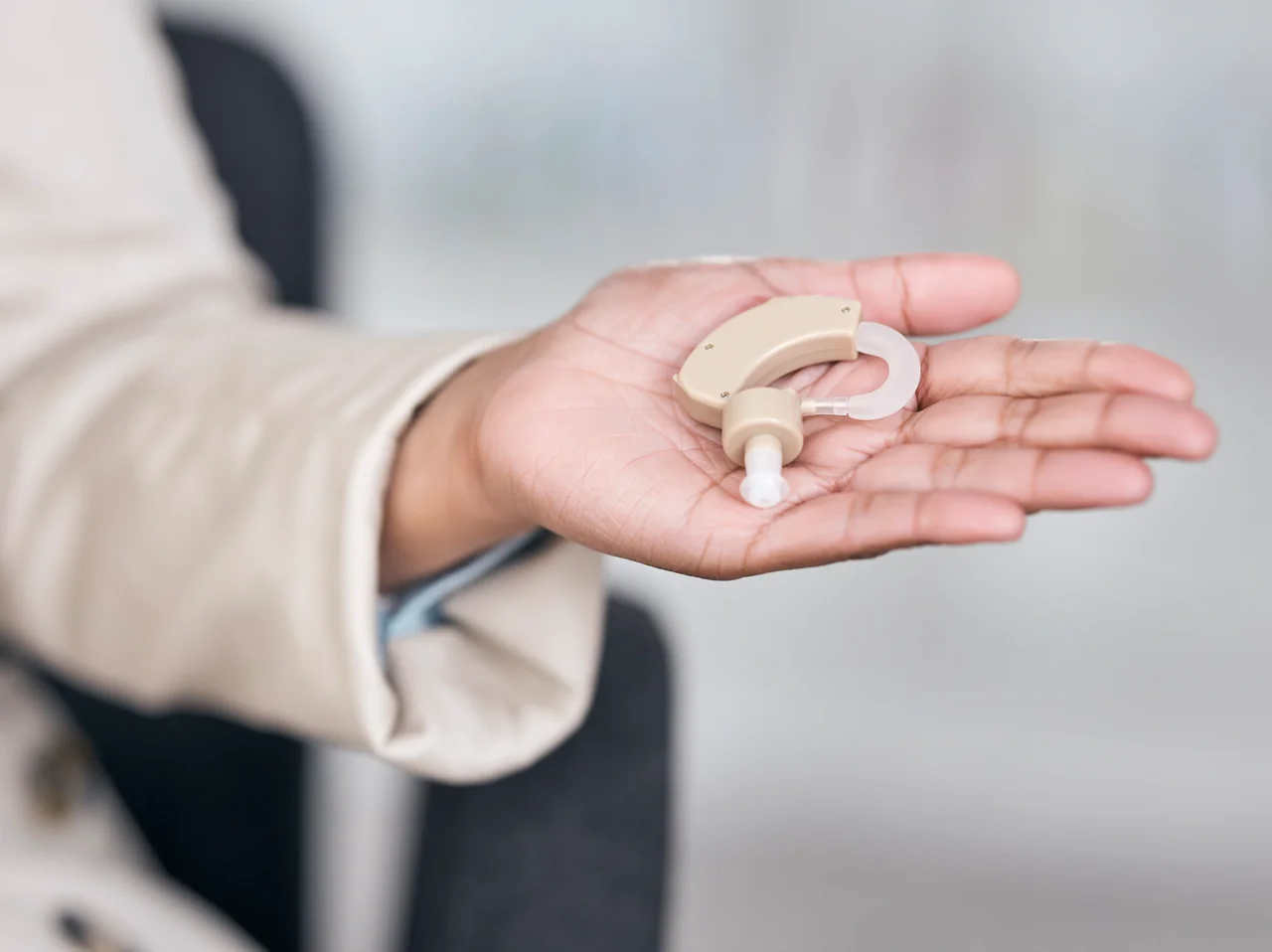 hearing-aid-medical-and-deaf-with-hands-of-person